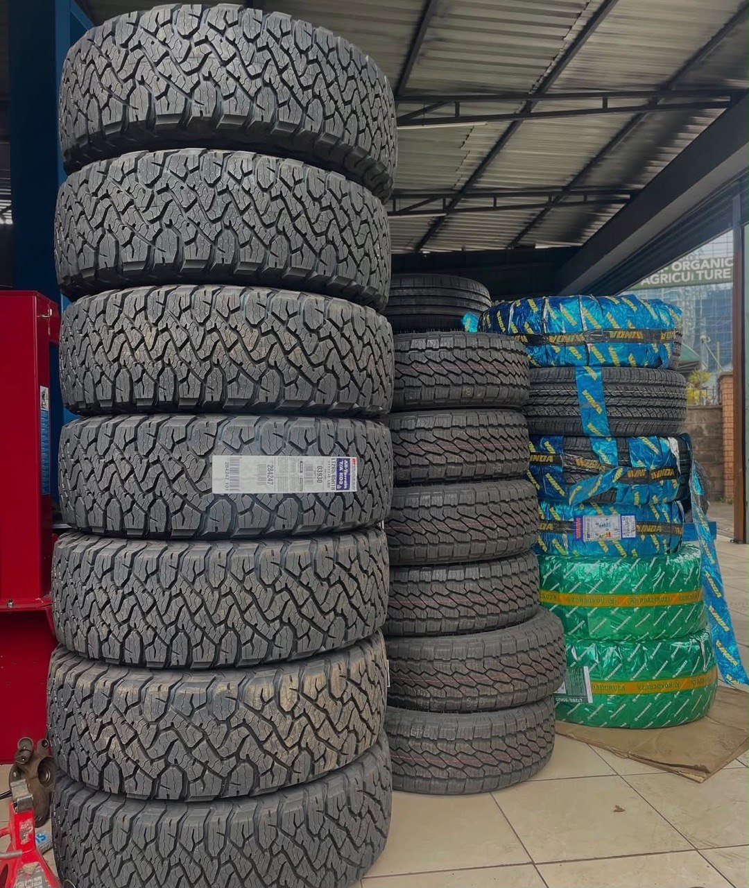 Stacks of all-terrain tyres at the Tyrex Kenya shop